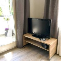 Flatscreen-Fernseher mit Sat-TV © Kisch Flatscreen-Fernseher mit Sat-TV © Kisch