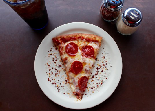 Pizzastück © Pexels/Sydney Troxell Pizzastück © Pexels/Sydney Troxell