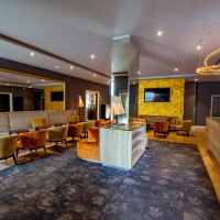 Lobby mit Lounge &copy; Caravelle Hotel im Park