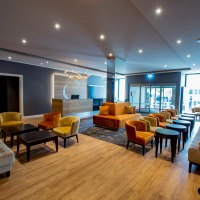 Lobby mit Lounge &copy; Caravelle Hotel im Park
